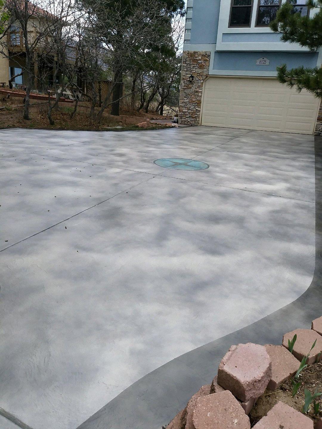 Acid wash driveway with compass medallion