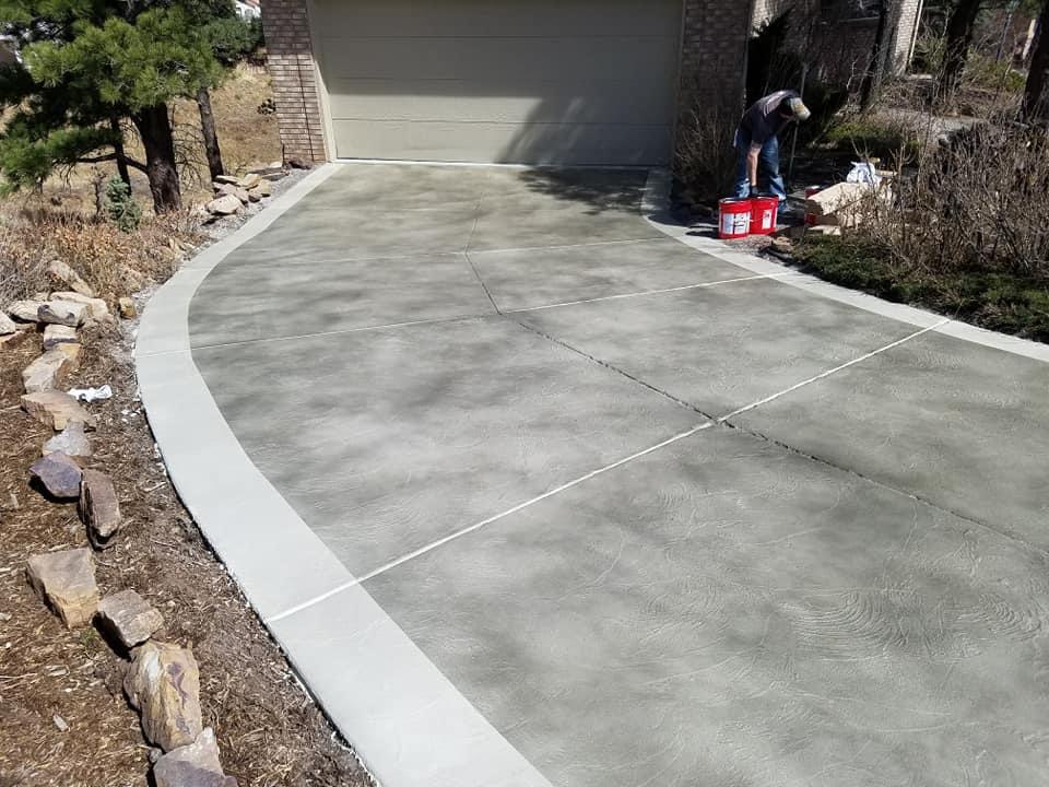 Grey stamped acid wash driveway