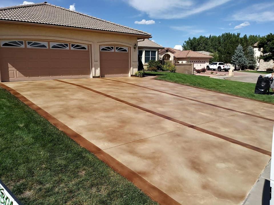 Long driveway resurfaced with solid body stain
